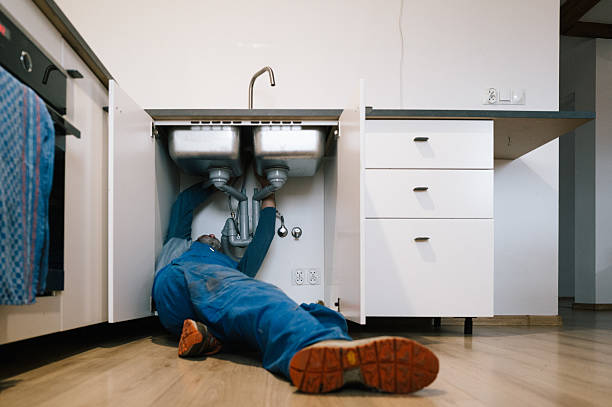Professional Plumbing technician working in Hollis, NH